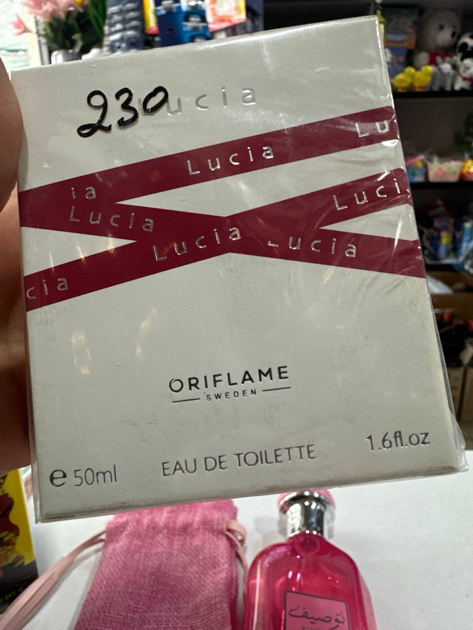 Oriflame Lucia Atir suvi (Eau de Toilette), 50 ml - Qizil
